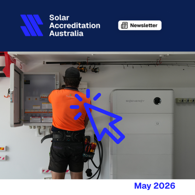 SAA Newsletter banner. Image shows a Springers Solar installer working on a battery installation.